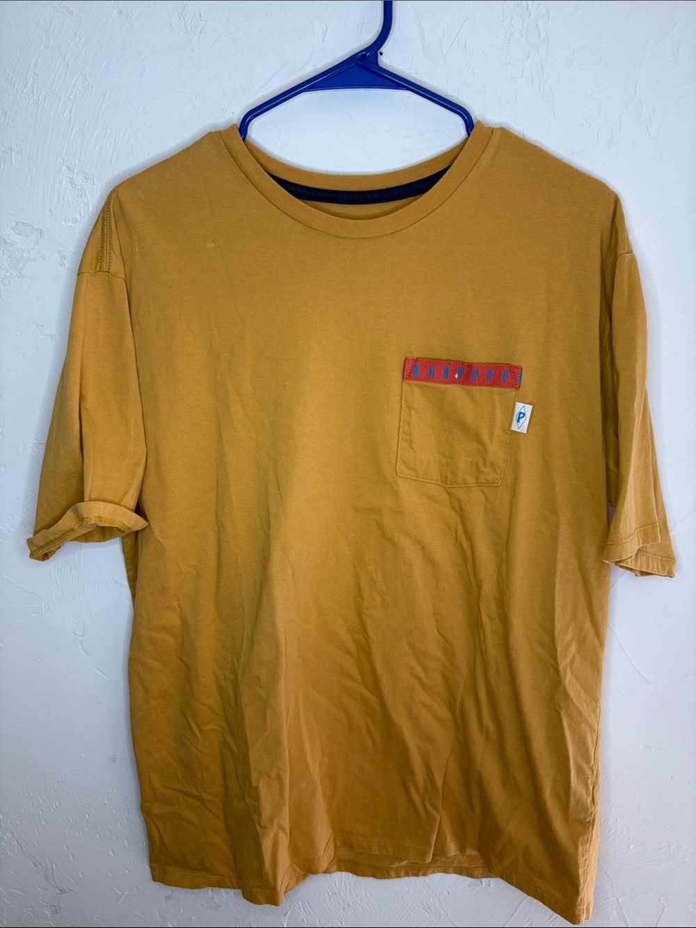 Patagonia Men's Mustard Short-Sleeve Pocket Tee with Red Trim